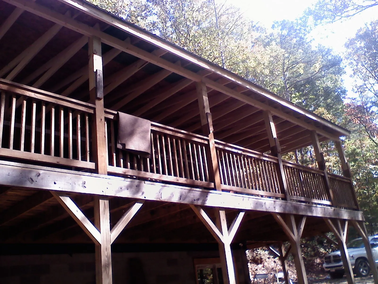 Timber framing under a new elevated porch and deck — Roof Leak Repair in Fairchild Air Force Base by Roofing Brothers